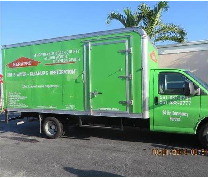Close-up of SERVPRO truck in front of building